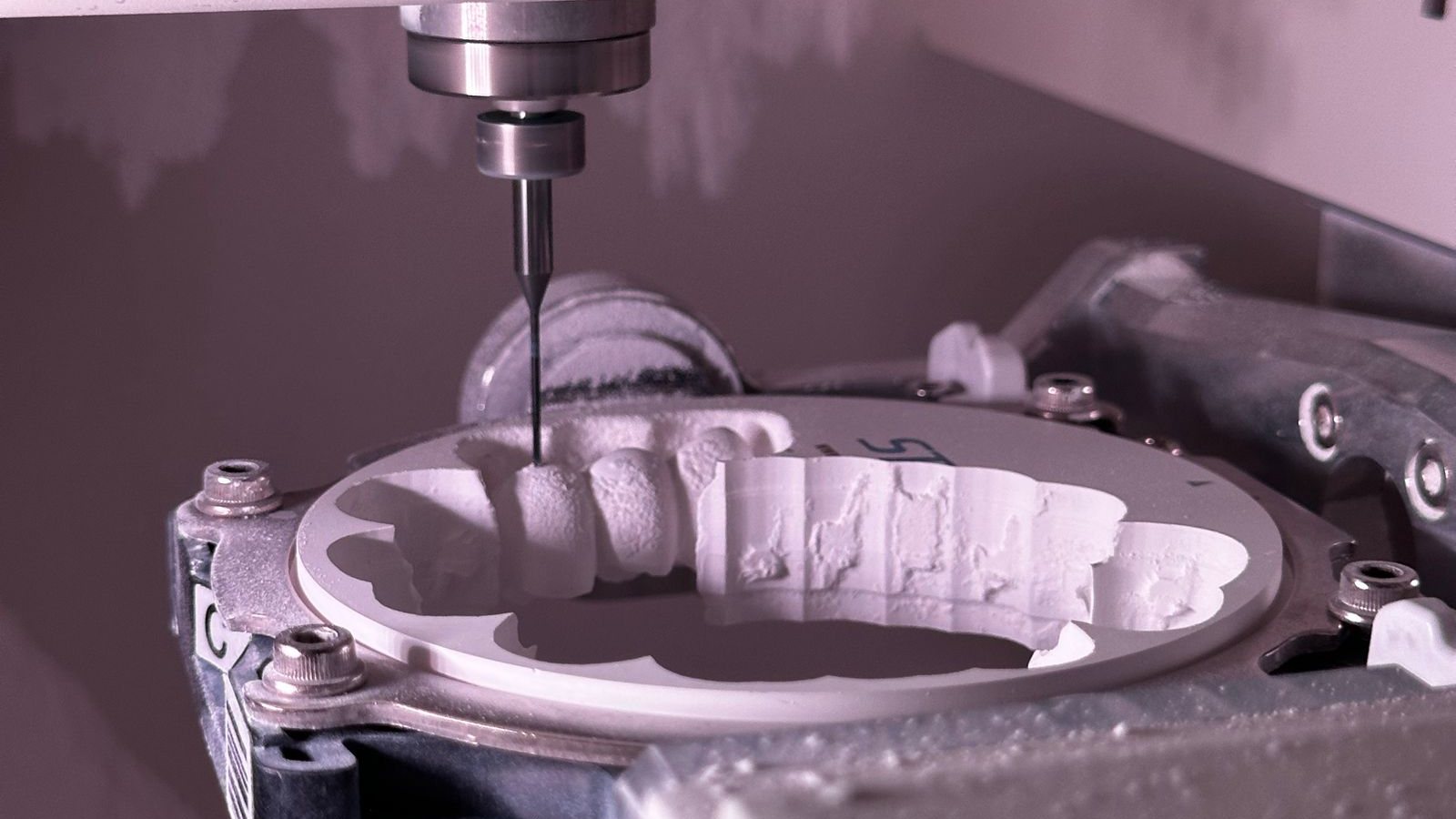 CNC grinding operation with coolant